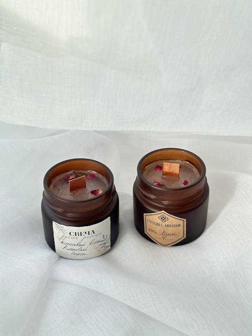Velas artesanales en frascos de vidrio